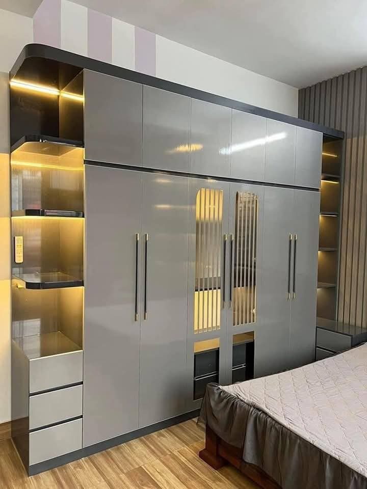 Arabi Wood custom wardrobe with gold detailing